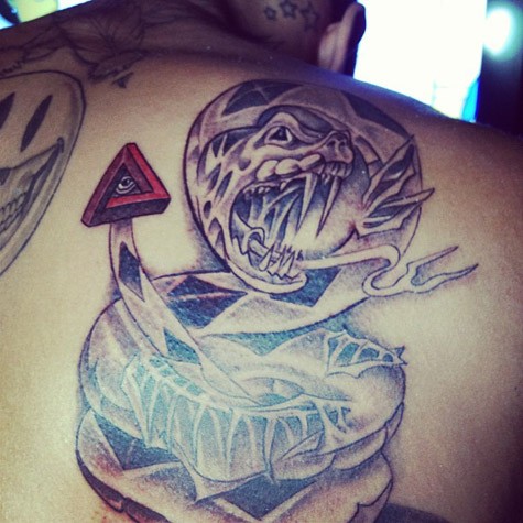 Chris Brown Illuminati Snake Tattoo